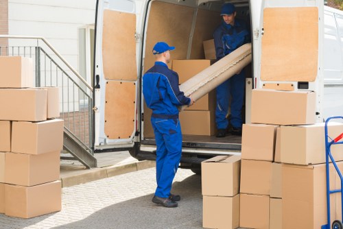 Staff member checking safety procedures at a storage facility