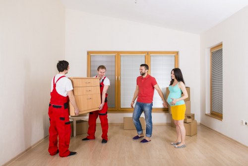 Local packing team organizing household items for a move in Bexley