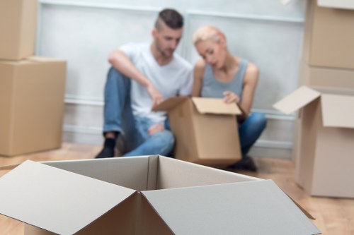 Professional movers loading furniture for storage and removals