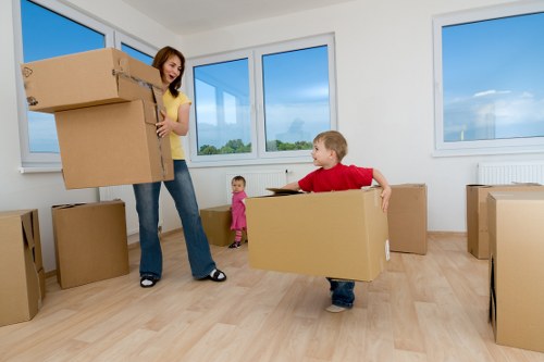 Professional removals team handling furniture during a Bexley move